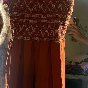 Elegant Rust Dress with White Accents